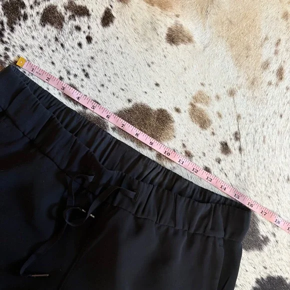 LULULEMON On The Fly Crop Pants In Black Size 10 - Picture 6 of 8